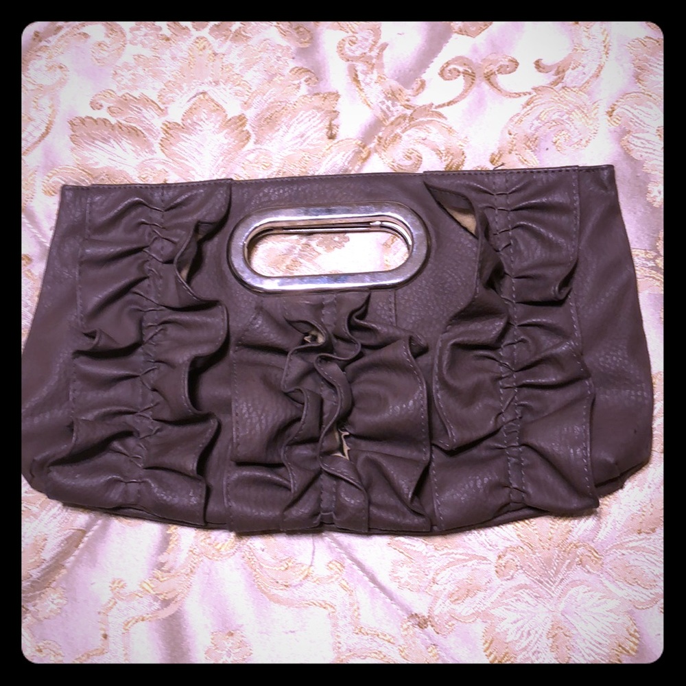 Gray frilly clutch with cut out